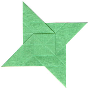 clockwisely rotating origami paper star