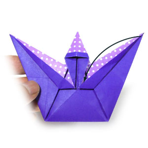 2nd picture of arm-crossing origami wizard
