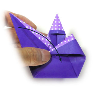 3rd picture of arm-crossing origami wizard