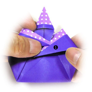 4th picture of arm-crossing origami wizard